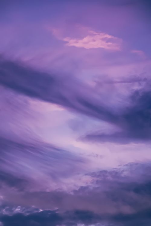 Free Serene purple clouds at twilight sky, creating a magical atmosphere over London. Stock Photo