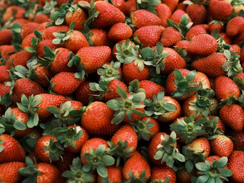 Fresh Strawberries with Green Leaves 