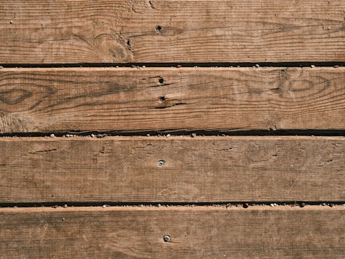 Brown Wooden Planks in Close Up Photography