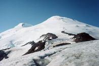 Snow Covered Mountains Under the Blue Sky