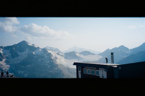 Бесплатное стоковое фото с горный хребет, горы, деревянный