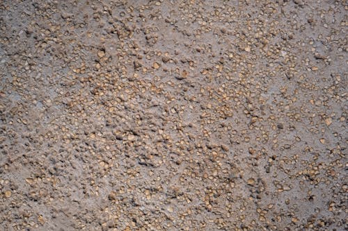Free Rough Asphalt Texture in Close-Up Photography Stock Photo