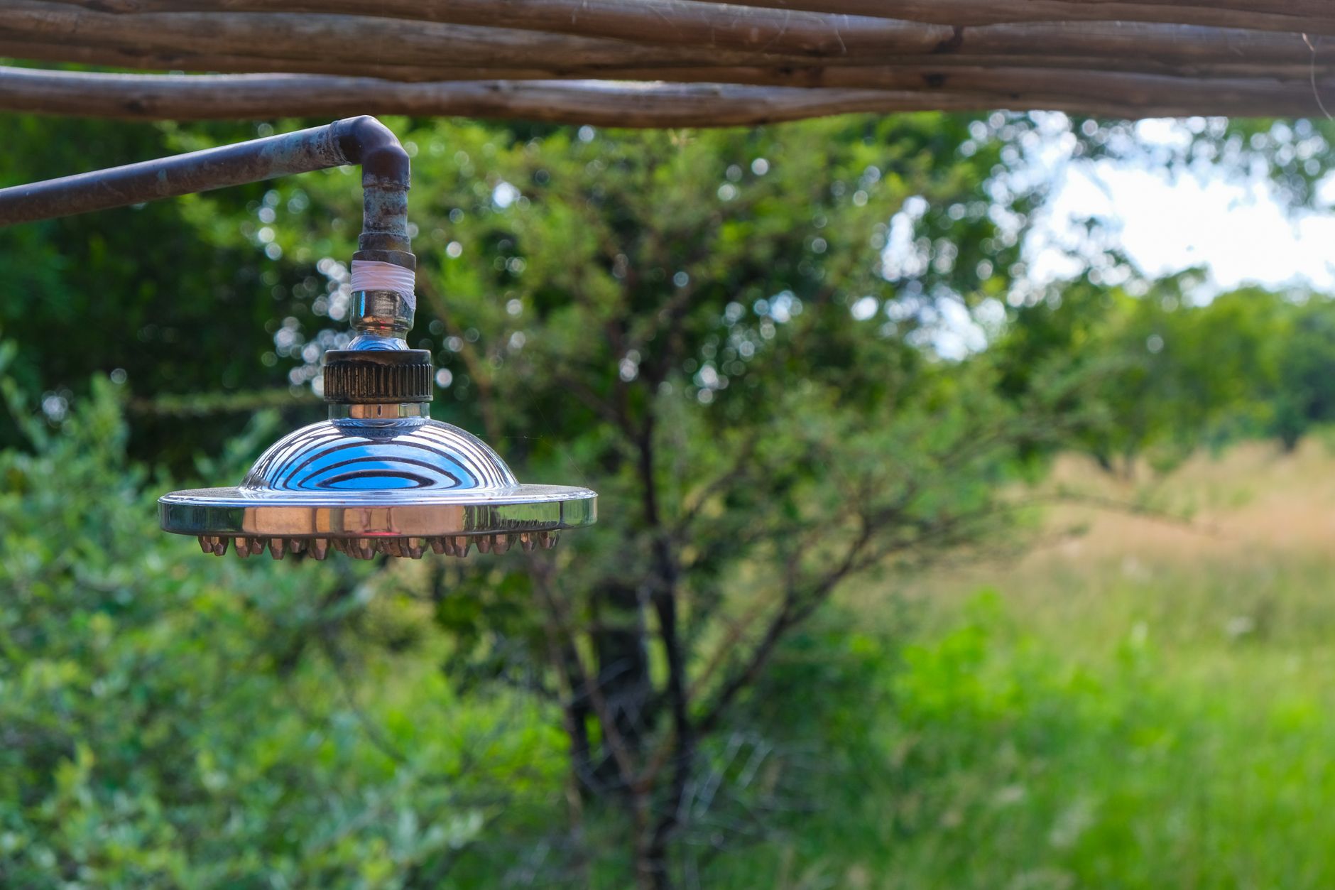 water container with shower head outdoor