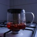 Glass teapot brewing on a stove - photo by Gonul Atasayar on Pexels