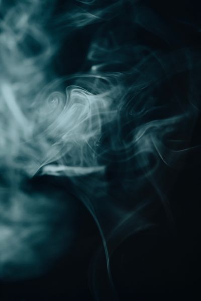Swirling smoke against a dark backdrop, photo by GURYAN on Pexels