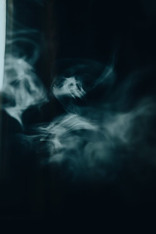 White Smoke on Black Background