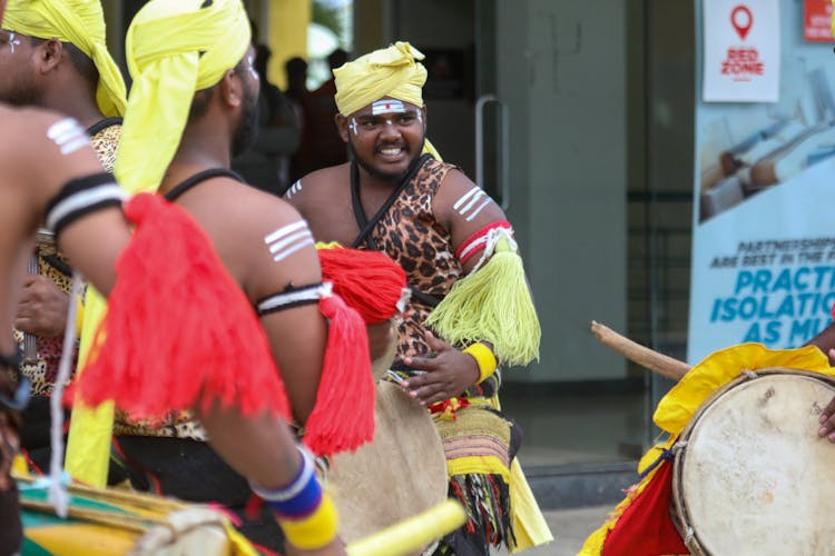 Man In Costumes At A Festival