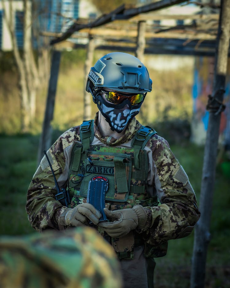 Man Wearing Protection Gear For Paintball Game