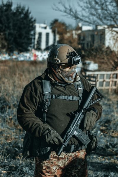 Figure in tactical gear — Ferdinando Cappiello on Pexels