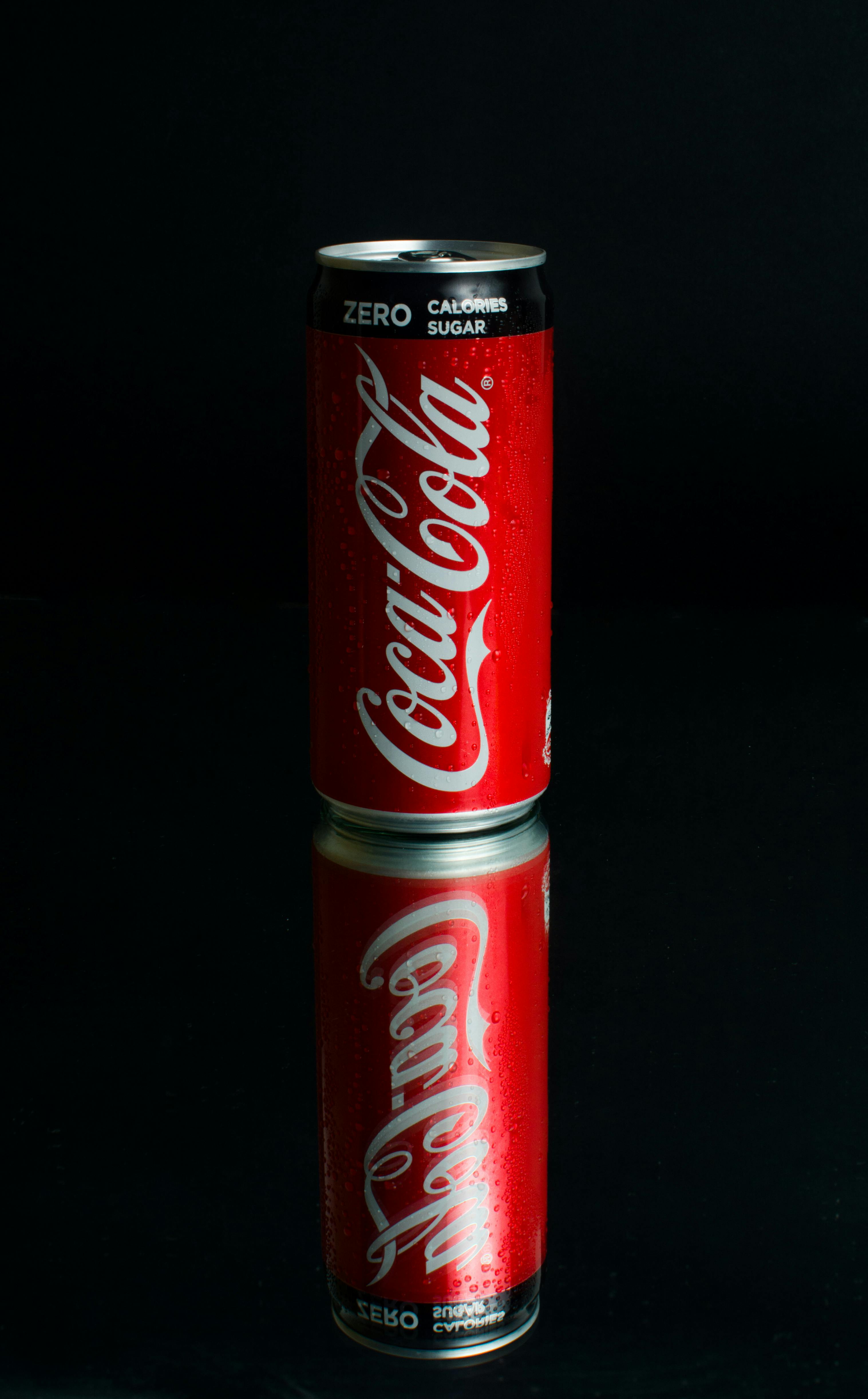 A Closeup Shot of a Coca Cola Can and a Redbull Can Next To Each Other on a  White Background Editorial Photo - Image of corporation, diabetes: 176641981