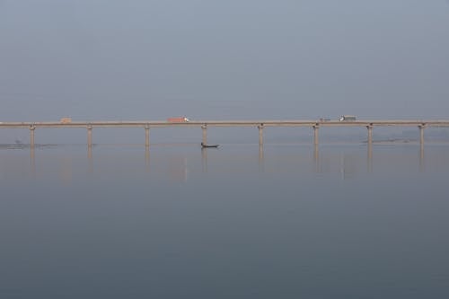 Free  Long Bridge Above River on a Foggy Day Stock Photo