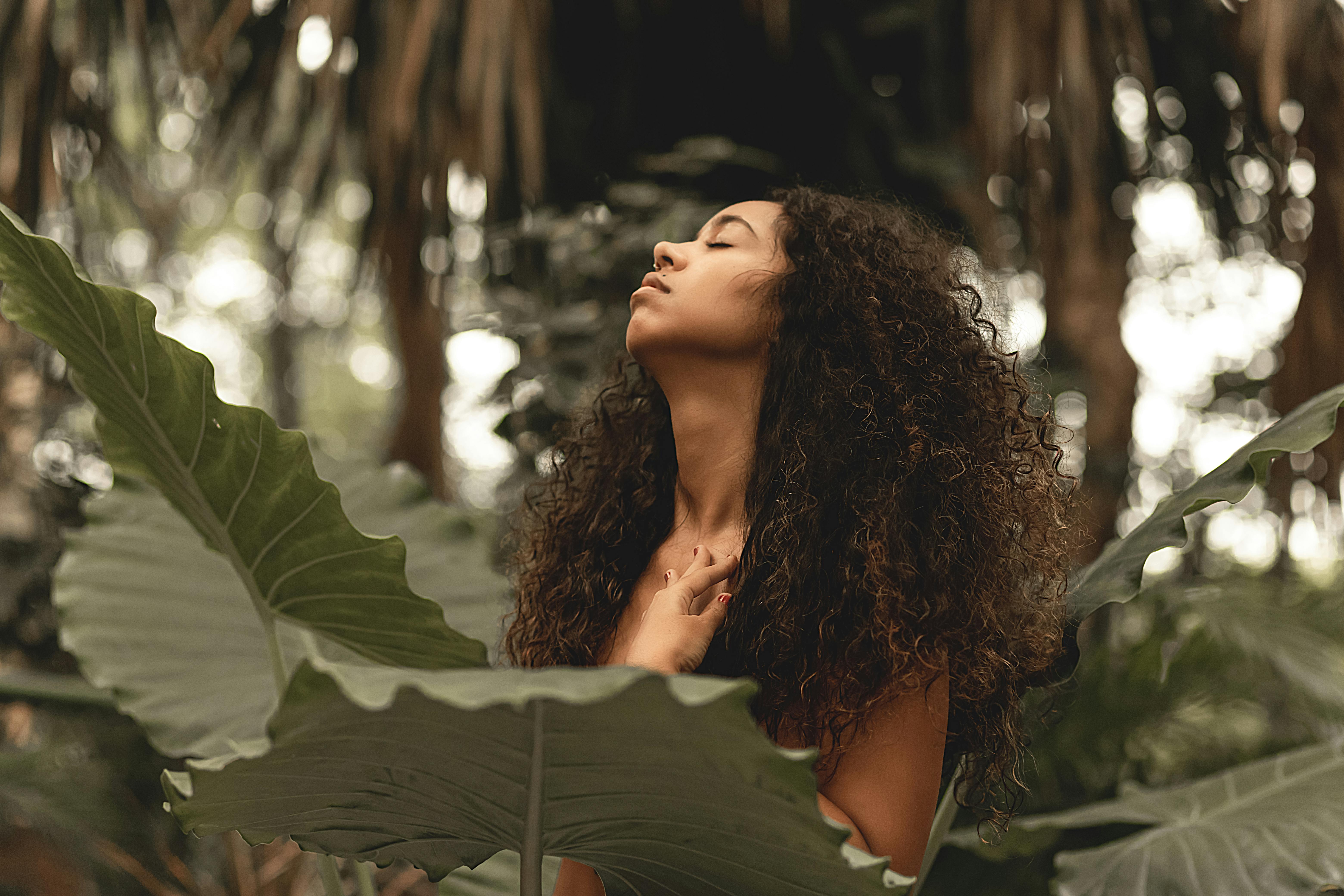 woman with lush foliage