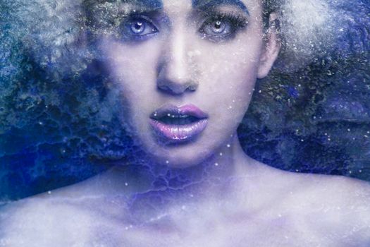 Woman in Water With Purple Flower