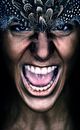 Persons Face With Black and White Face Paint