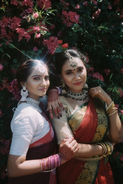 Women Wearing Traditional Sari Clothing