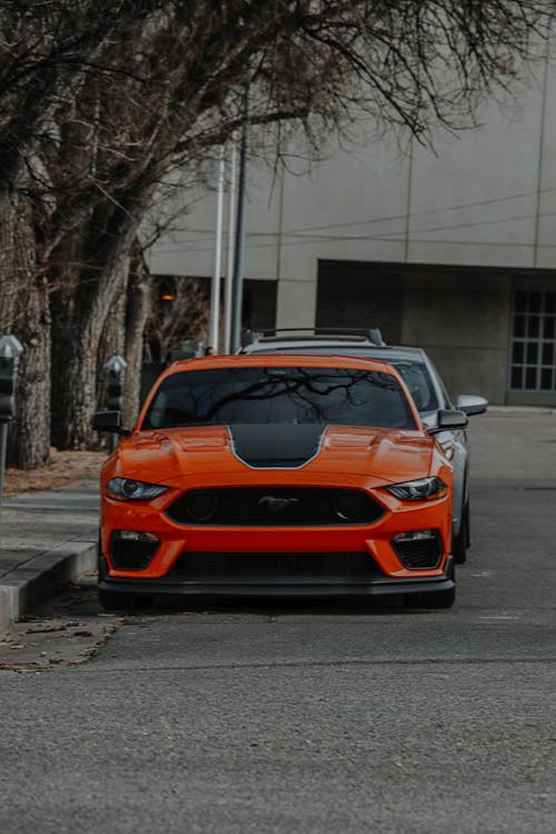 Orange Car Parked on the Street