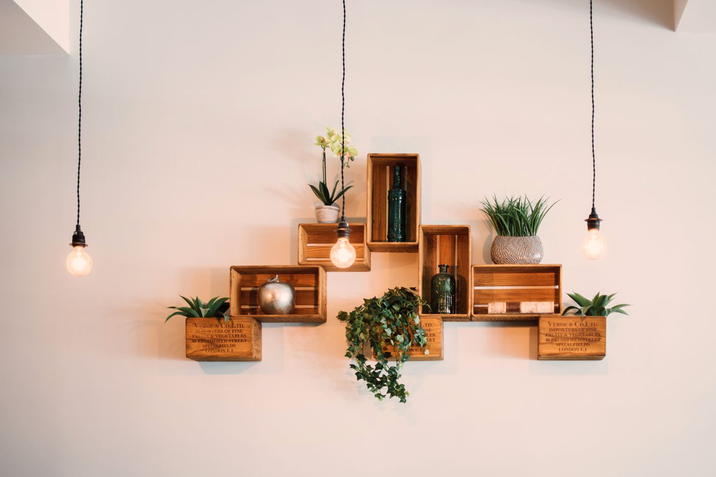 Open shelving with organized books, office objects, and modular storage compartments