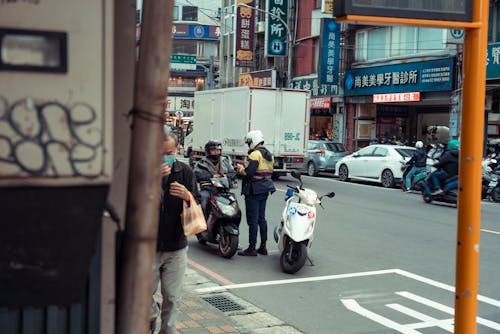 Police Officer Writing Ticket on Street