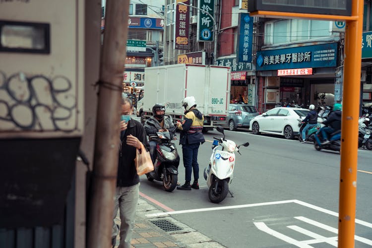 Police Officer Writing Ticket On Street