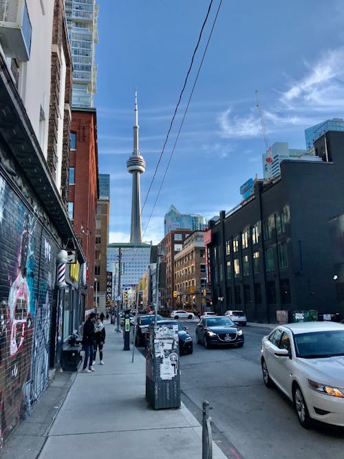 Free CN Tower Seen From a Street in Downtown Toronto Stock Photo