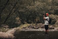 Photographer on a Stream