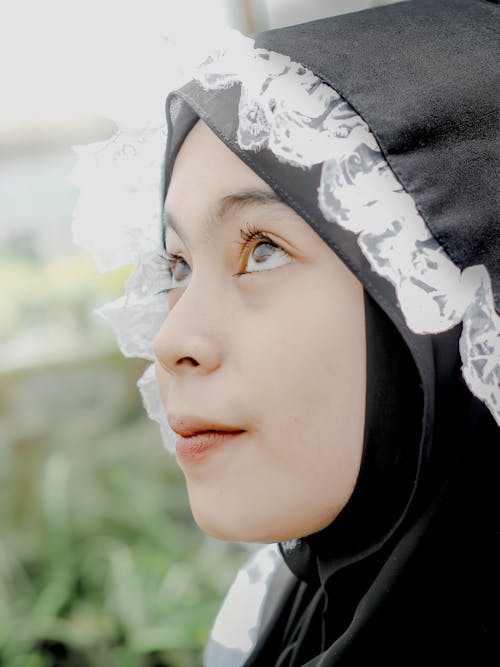Woman in Black Hijab in Close-Up Photography