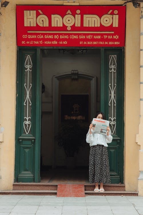Free Woman Reading Newspaper Stock Photo