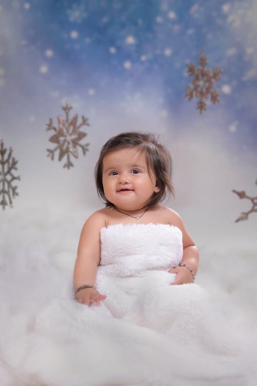 Free A Cute Baby Girl in White Tube Dress Stock Photo