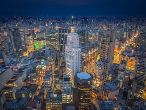 Aerial View of City Buildings during Night Time