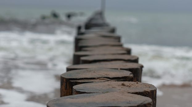 Close-up on Wooden Wave Breaker