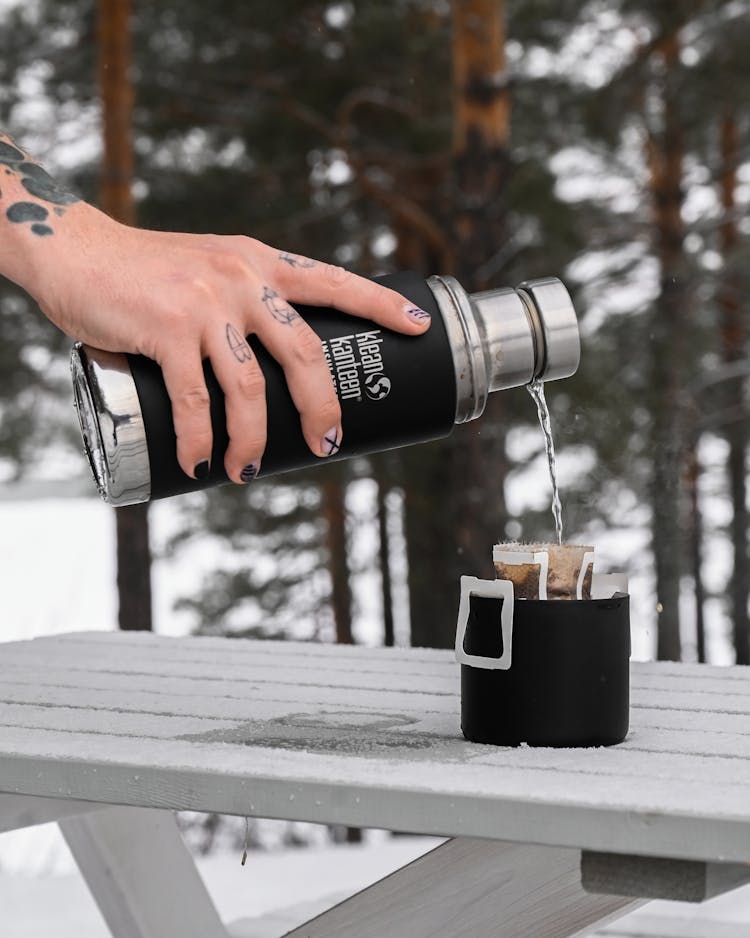 Pouring Water In Cup