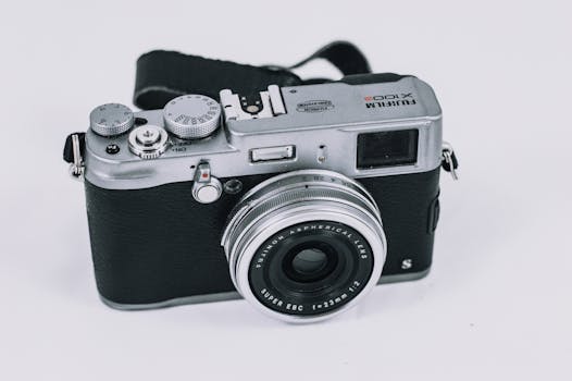 A classic vintage Fujifilm camera showcasing its retro design and manual features.