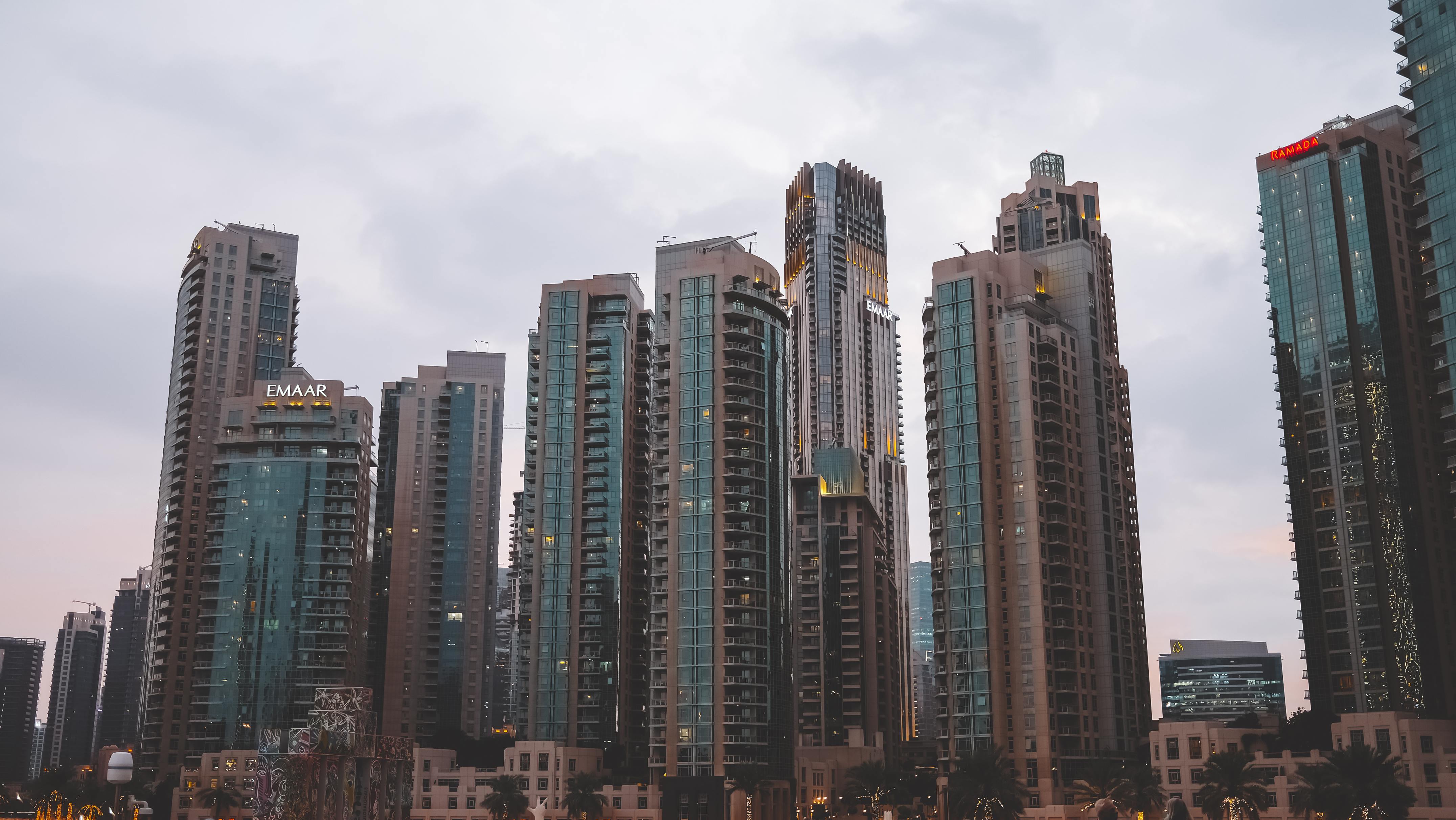 Skyline of tall skyscrapers in downtown Dubai showcasing urban architecture at dusk.