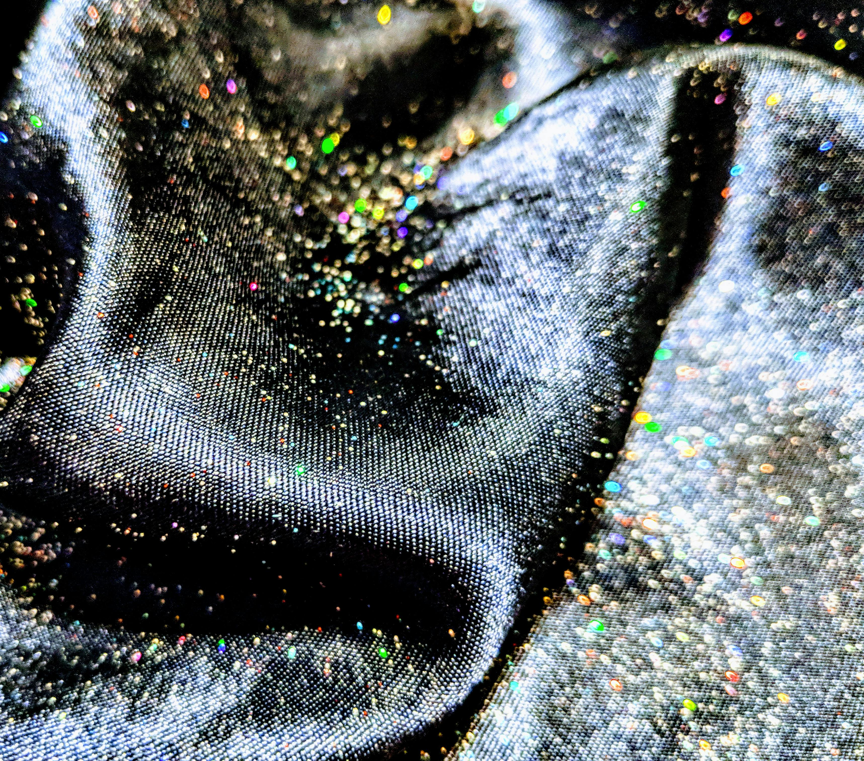Free stock photo of black satin sheet, Multicolor glitter