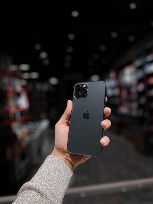 A Close-Up Shot of a Person Holding an Iphone