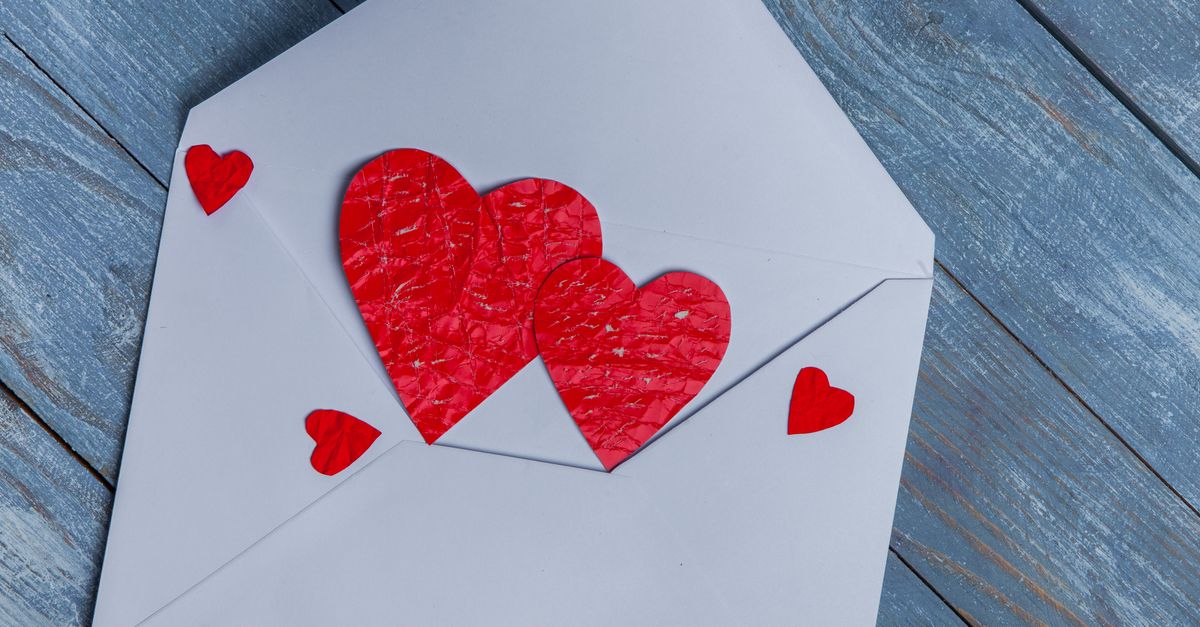 Envelope Expression Hear Cut Outs on an Envelope · Free Stock Photo