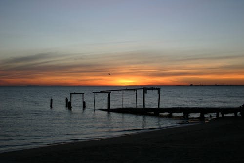 Free stock photo of beach, old pier, sunset