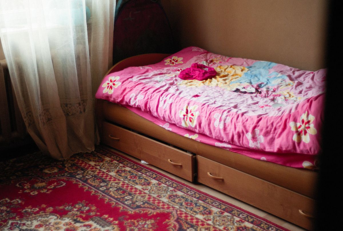 Bedroom with built in underbed drawers for hidden storage