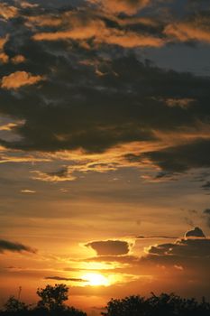 Captivating sunset scene with golden hues over Odisha landscape, offering serene beauty and tranquility.