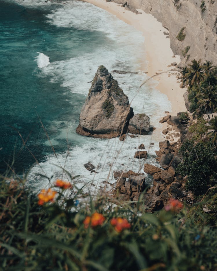 One Big Stone And Smaller Stones On The Coast