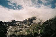 Mountains Under White Clouds