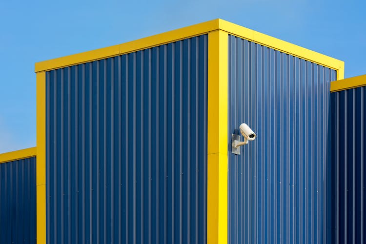 A Security Camera On A Metal Decking Wall