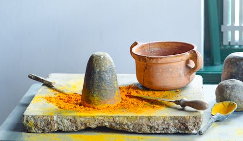 Free Brown Clay Pot on Gray Surface Stock Photo