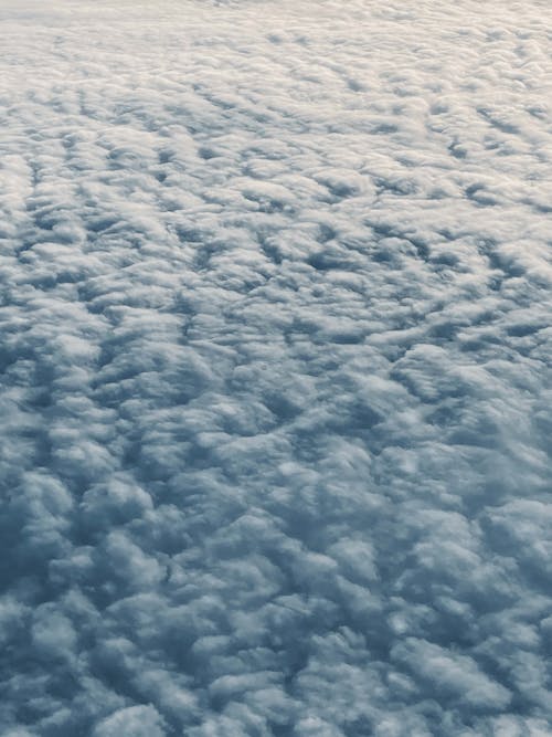 在云层之上, 垂直拍摄, 白色的云 的 免费素材图片