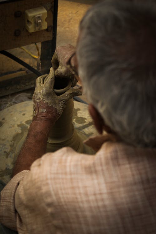 A Person Engaged in Pottery