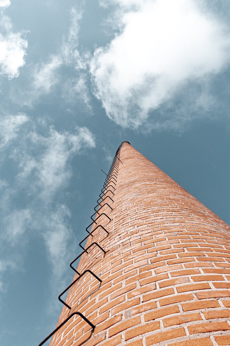 Low Angle Shot Of Industrial Chimney