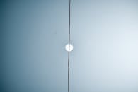 Abstract Image of a Sky with Moon and Electric Wire