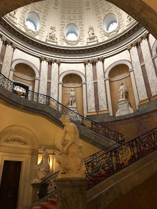 Stairway in an Ornate Building with a Dome 