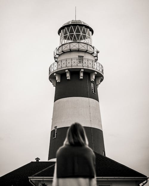 Woman Looking at Lighthouse 