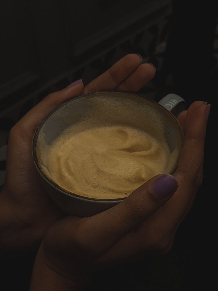 Cup With Cream In Woman Hands